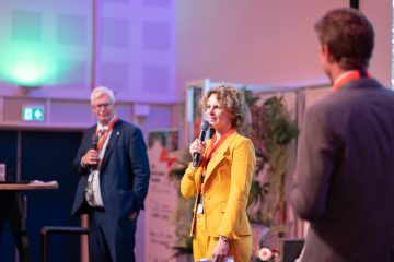 Hans and Rianne Vrijenhoef on stage - NH3 Event Europe 2024